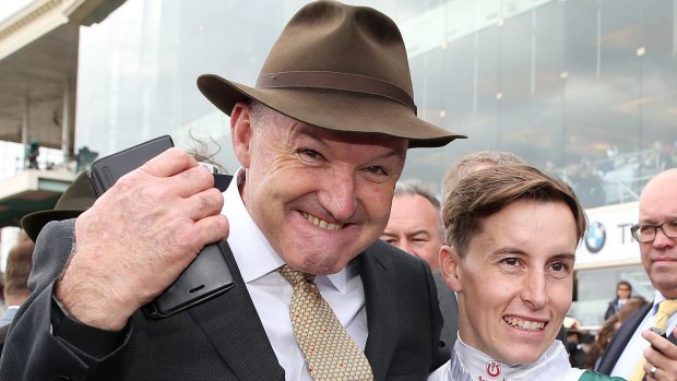 Unexpected: David Hayes and young Kiwi jockey Cory Parish enjoy their breakout triumph.