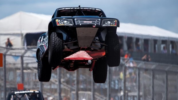 Upwardly mobile: Burt Jenner soars in his super truck.