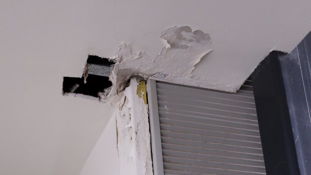 Water leaking from the ceiling of a new apartment complex.