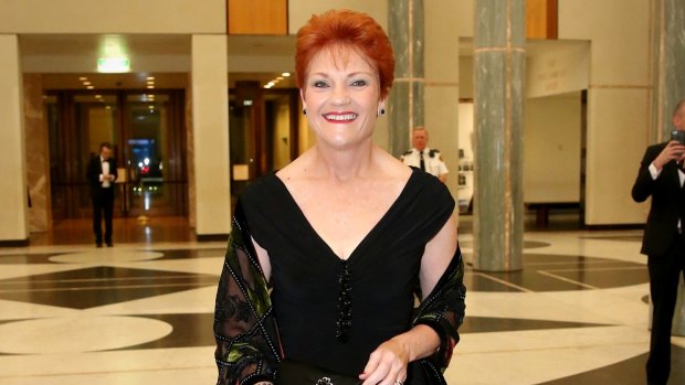 Senator Pauline Hanson arrives for the Mid-Winter Ball at Parliament House in Canberra.