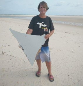 Blaine Gibson with a piece of the wreckage he found off the Mozambique coast. 