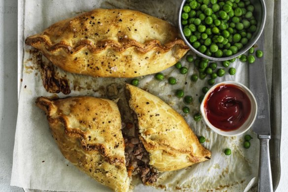 Serve these Cornish pasties with peas and tomato sauce.