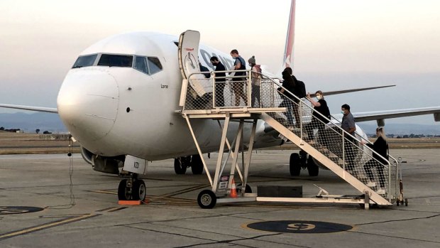 Passengers board Qantas 737 at Launceston Airport.
