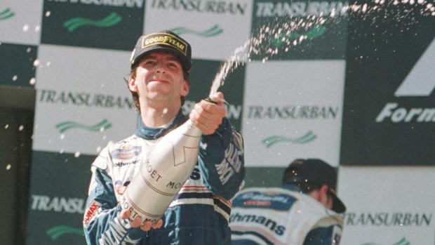 Damon Hill celebrates his win in the Australian Grand Prix in 2006.