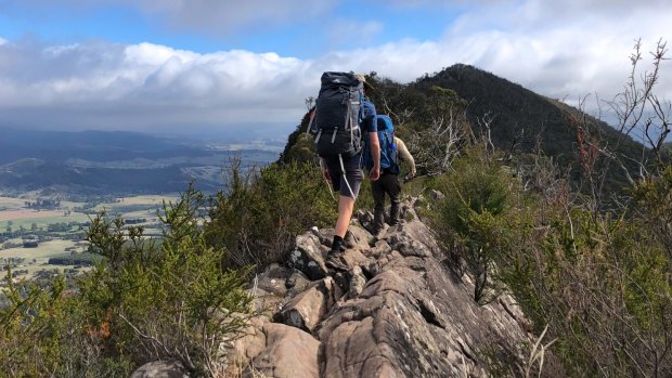 Hiking the Cathedral Range in Victoria often means walking atop a narrow sliver of sandstone on the ridge. 