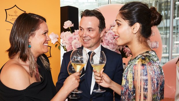 Canberra woman Mikaela Jade, winner of the a New Generation Award, sponsored by Veuve Clicquot with the champagne house's international director Thomas Bouleuc and Hollywood actress Freida Pinto.