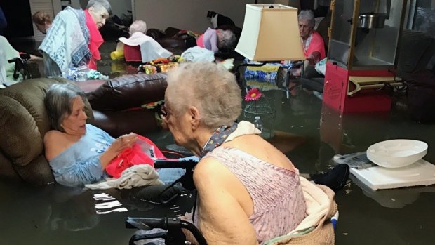 The viral image: residents of the La Vita Bella nursing home in Dickinson, Texas, sit in waist-deep flood waters caused by Hurricane Harvey. 