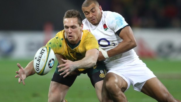 No breathing space: Dane Haylett-Petty is put under pressure by Jonathan Joseph.