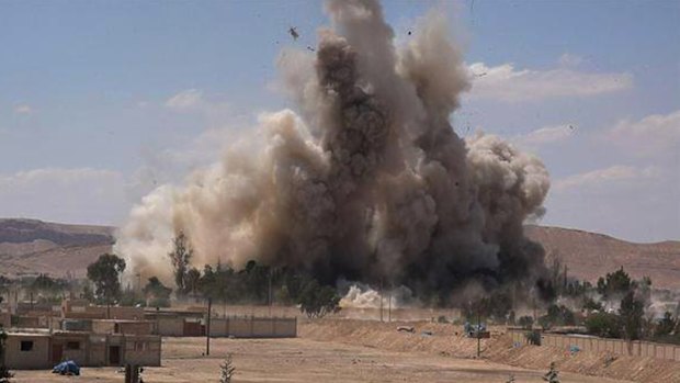 Tadmur prison in Syria is blown up by the Islamic State group in May in this image from a militant website.