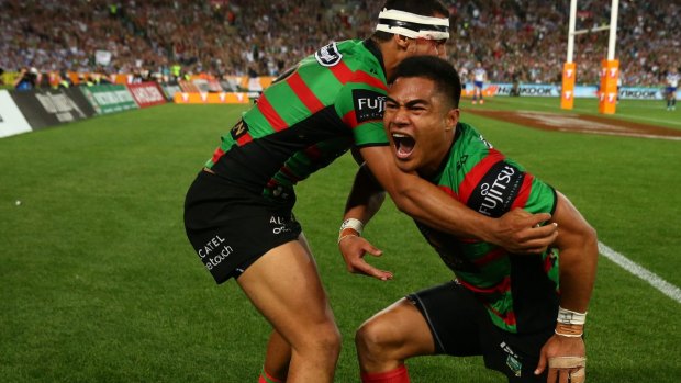 Kirisome Auva'a celebrates after scoring in the grand final. Souths had previously fined him $2000 and banned him for one week.