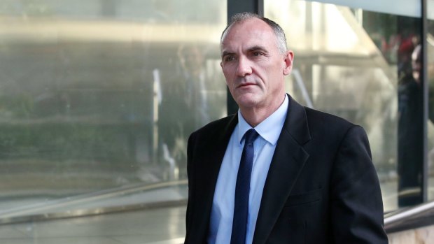 Michael Elliott leaves the Royal Commission in Newcastle after giving evidence on Thursday.