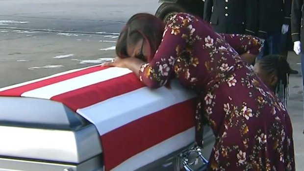Myeshia Johnson cries over the casket in Miami of her husband, Sergeant La David Johnson.