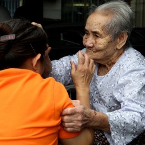Nam Hut Hoy, who has Alzherimer's disease, becomes a handful for daughter Seam Heang Sam.