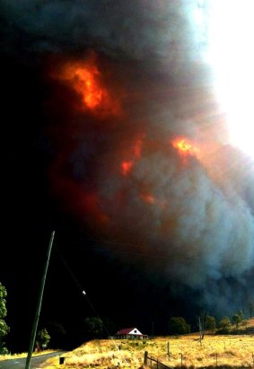 The fire on the road between Coonabarabran and the Warrambungles, about 6pm on Sunday January13, 2013.