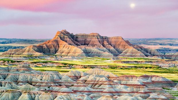 Colorful formations jut up from the prairies in Badlands National Park, South Dakota