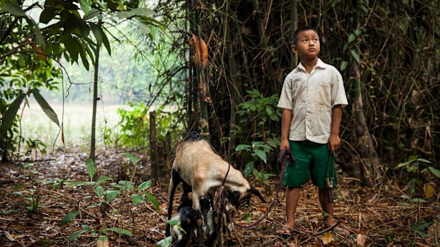 Saw Ba Sun, 9, was injured by an unexploded landmine two years ago in Ann Ka Law village, Kyin State.