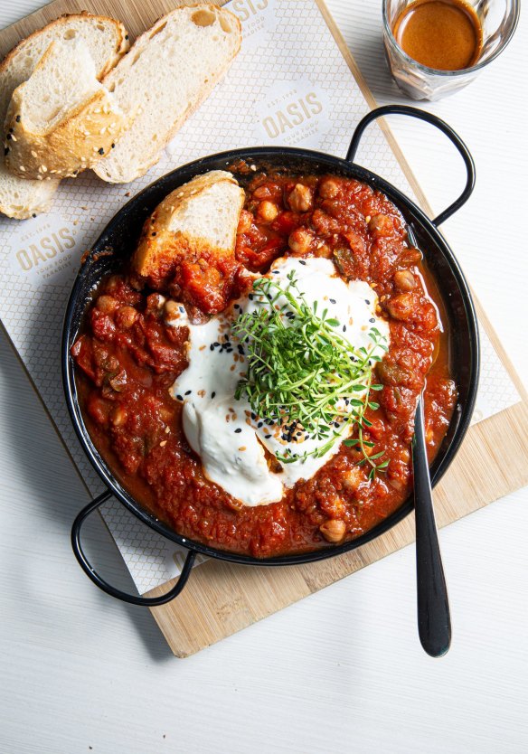 Shakshuka - eggs baked in chickpea and onion-mined tomato sauce.