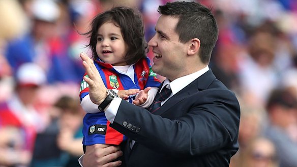 The end: Newcastle's James McManus, with daughter Emelyn, says farewell to supporters in 2016 after retiring from football in July 2015.