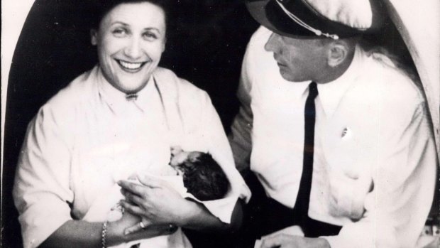 A woman, named Mrs. Sabbagh, traveling on the plane ''Comet'' gave birth to a baby-girl somewhere between Dakar and Casablanca at 36.000 feet, in 1966. Pictured, an air-hostess photographed with the new born baby.