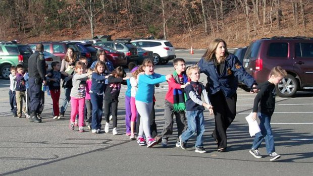 Children being led from Sandy Hook Elementary School during the 2012 massacre.