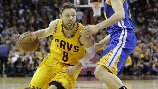 Magnet for controversy: Cleveland Cavaliers guard Matthew Dellavedova drives against Golden State during the first half of Game 3 of the NBA Finals in Cleveland.