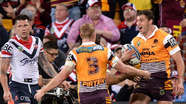 Roosters misery: Corey Oates celebrates scoring just before half-time.