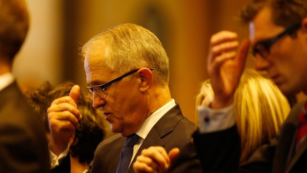 Australian Minister of Communications Malcolm Turnbull attends a mass to pay respect to the victims of the Martin Place siege.