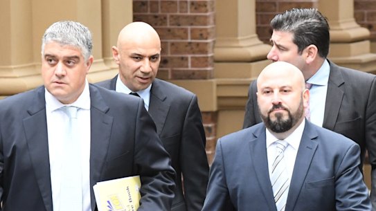 From left, lawyer Nick di Girolamo, Moses Obeid, Eddie Obeid jnr, lawyer Tim Breene (back) and Paul Obeid at the Supreme Court last year.