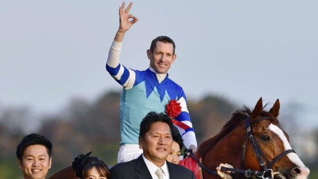 World's best: Hugh Bowman celebrates winning the Japan Cup on  Cheval Grand.