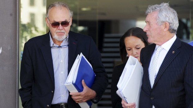 Vytautas (Vytas) Kapociunas, left, leaves court with his barrister Bernard Collaery earlier this year.