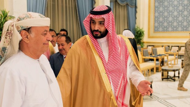 Yemeni President Abed Rabbu Mansour Hadi, left, with Saudi Defence Minister Prince Mohammed bin Salman in Riyadh, Saudi Arabia, on March 26 after Mr Hadi fled Yemen.