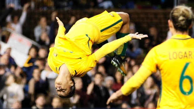 Sam Kerr performs her signature celebration after scoring against Brazil.