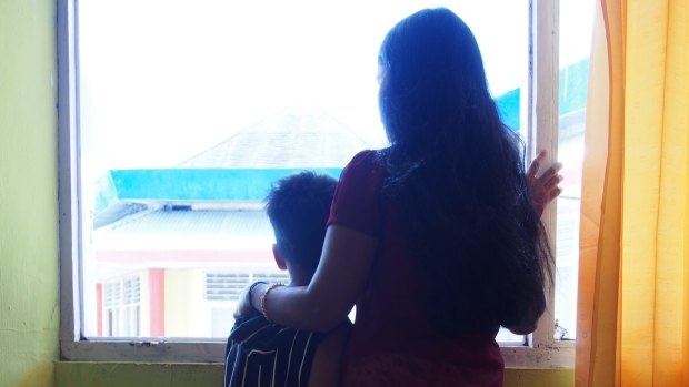 Asylum seekers in immigration detention in Kupang, East Nusa Tenggara in August, after their boat was intercepted and turned back by Australian officials.