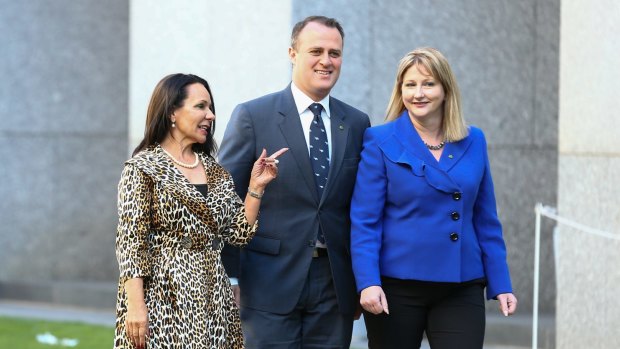 Incoming Member for Barton Linda Burney, incoming Member for Goldstein Tim Wilson and incoming Member for Mayo Rebekha Sharkie pose for photos in the courtyard after a seminar for new members at Parliament House .