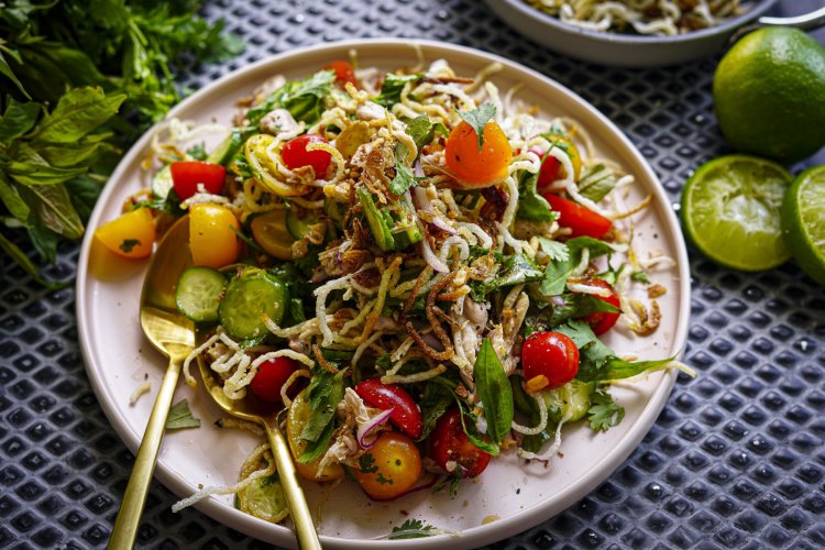 Vietnamese tomato salad with poached chicken and crispy vermicelli. 