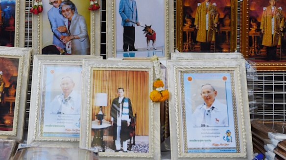 Portraits of King Bhumibol on sale at a Bangkok market stall.