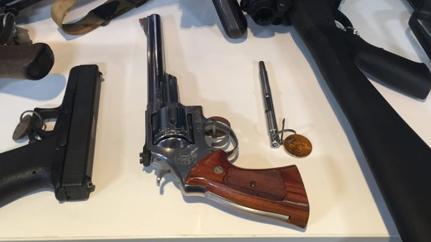 Two handguns and a pen pistol included in the police haul.