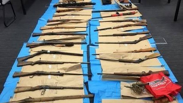 The 28 firearms police discovered at a property near Forbes in central west NSW in April.