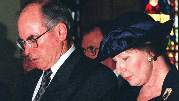 The Prime Minister and his wife Janette in 1996 at a Canberra service to pray for the victims and families of the Port Arthur tragedy.