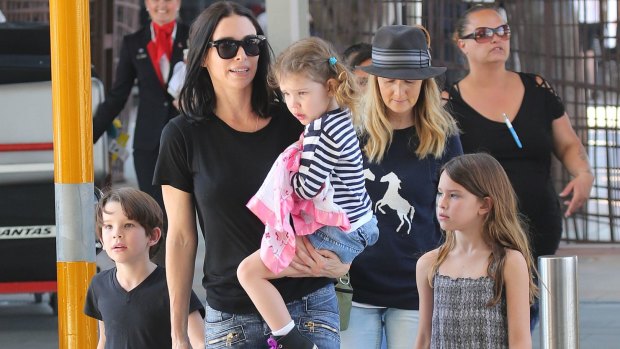 Erica Packer with children Jackson, Indigo and Emmanuelle, who have not been seen near their father during his recent excursions  with Carey. 