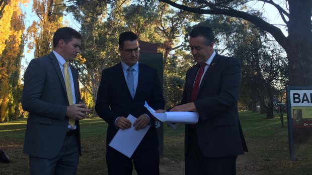 From the left, ACT Liberal leader Alistair Coe, federal ACT senator Zed Seselja and federal infrastructure minister Darren Chester, standing at one of the black spot sites in Canberra.