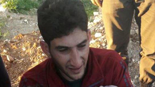 Abdulhamid al-Youssef holds his twin babies who were killed during a suspected chemical weapons attack in Khan Sheikhoun town, in the province of Idlib, Syria