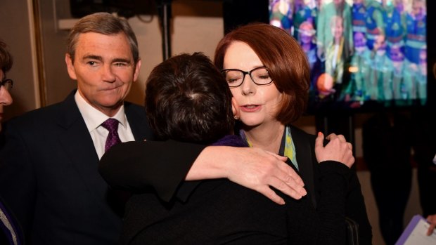 Former Victorian premier John Brumby with former prime minister Julia Gillard. 