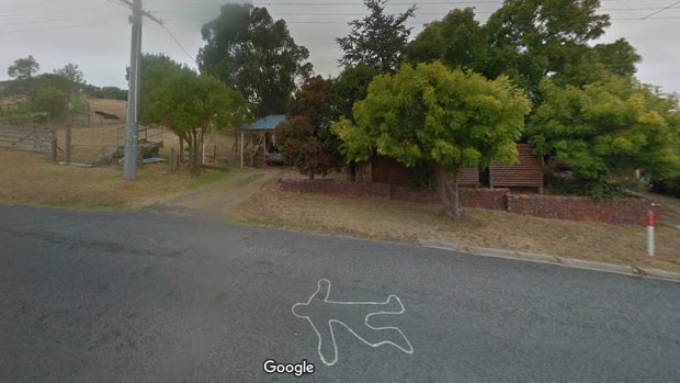 A body outline was drawn on the road directly in front of Darran Scott's property on the Bass Coast in 2013.