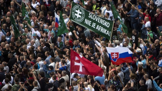 Anti-immigrant demonstrators in Bratislava hold a banner reading "Slovakia is not Africa".