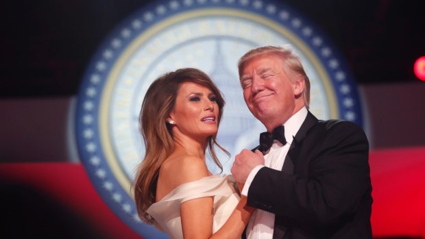 President Donald Trump and first lady Melania Trump dance after the inaguration.