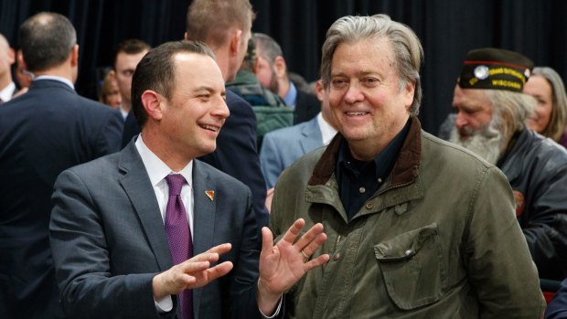 Trump's chief of staff Reince Priebus, left, talks with his chief strategist Steven Bannon last month.