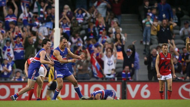 Brad Johnson of the Western Bulldogs celebrates a goal in the dying moments of the game against Melbourne at Docklands Stadium on May 13, 2007. It is the last time Melbourne won at the venue.