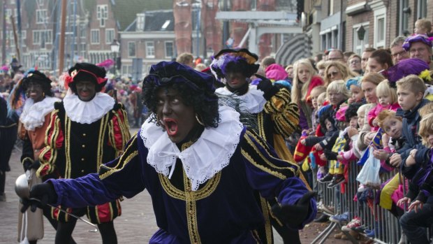 A bevy of Black Petes add colour to the parade in Hoorn, north-western Netherlands. 