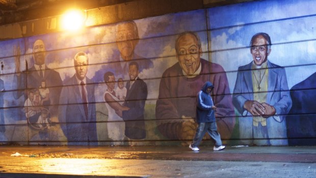 A mural in Bill Cosby's native Philadelphia shows the comedian alongside South African leader Nelson Mandela and Martin Luther King jnr. In his Baltimore show, Cosby referenced his connection with the late Mandela.